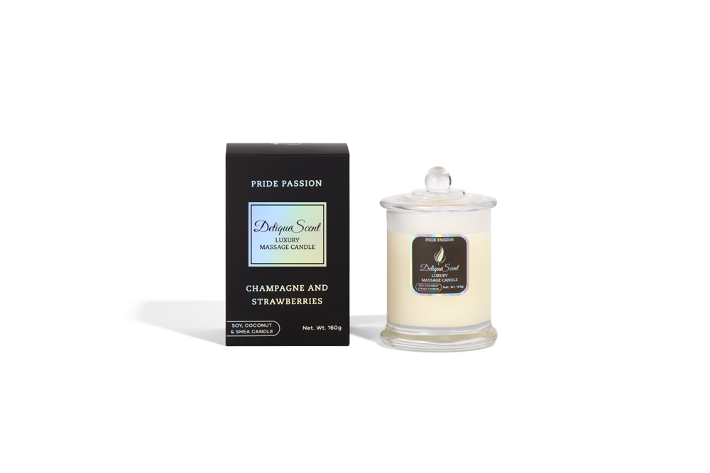 Body Safe, Organic Massage Candle in Pride Passion Scent, which is Champagne and Strawberries fragrance Holographic Rainbow Highlights on a black box next to the glass massage candle.